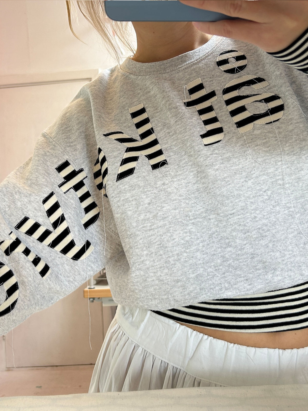 MERCH SWEATER